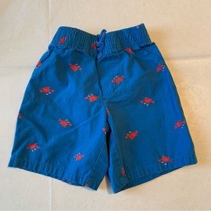 Boy Swim Trunks Blue with red crabs.